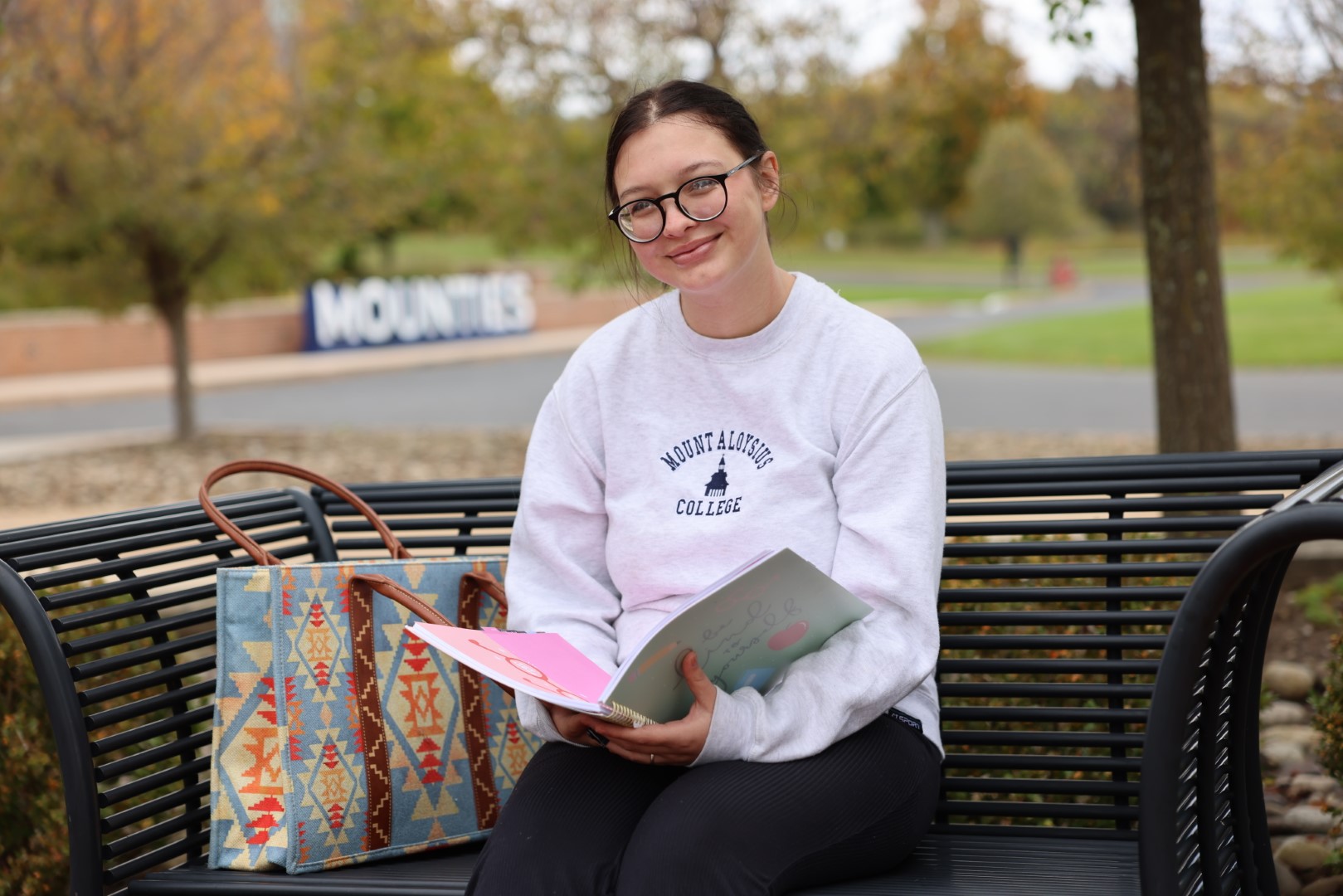4V9A4746 (Large) Student with a book outdoor
